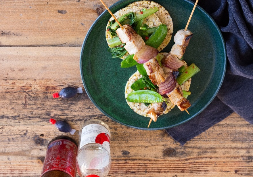 Leftovers for lunch - Corn Thins with Asian grilled pork & garlic greens