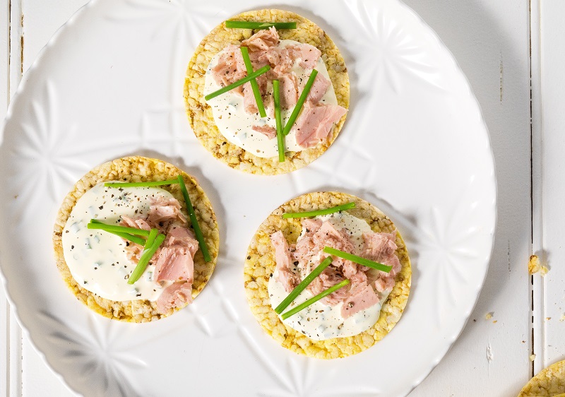 Sour Cream, chopped chives & tuna on CORN THINS slices