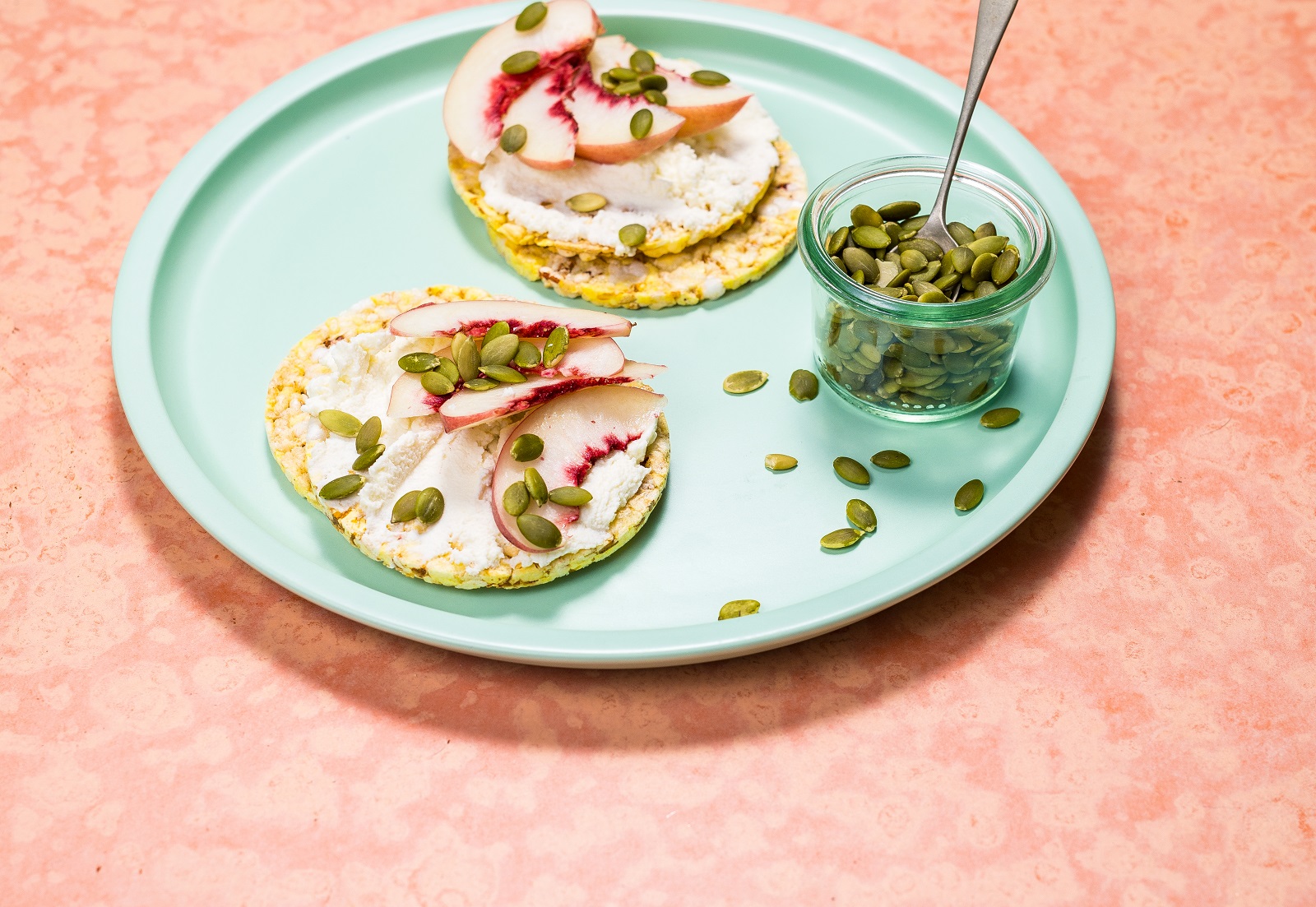 Ricotta, Peach & Pepita on CORN THINS slices