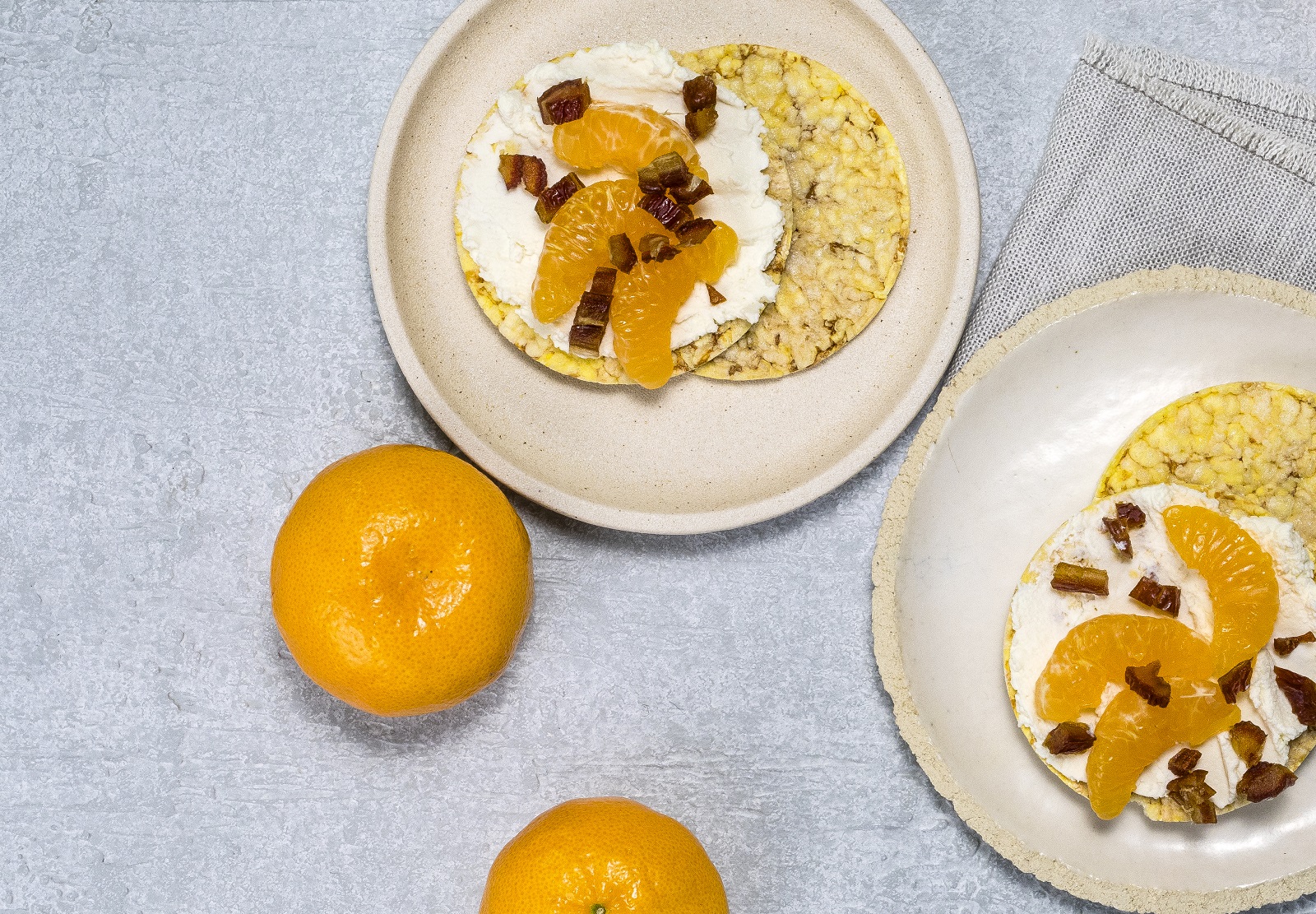 Ricotta, Mandarin & Chopped Dates on CORN THINS slices