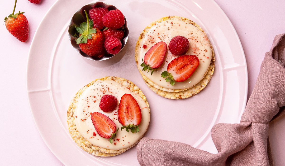 White chocolate, raspberries & strawberries on CORN THINS slices. A decadent treat