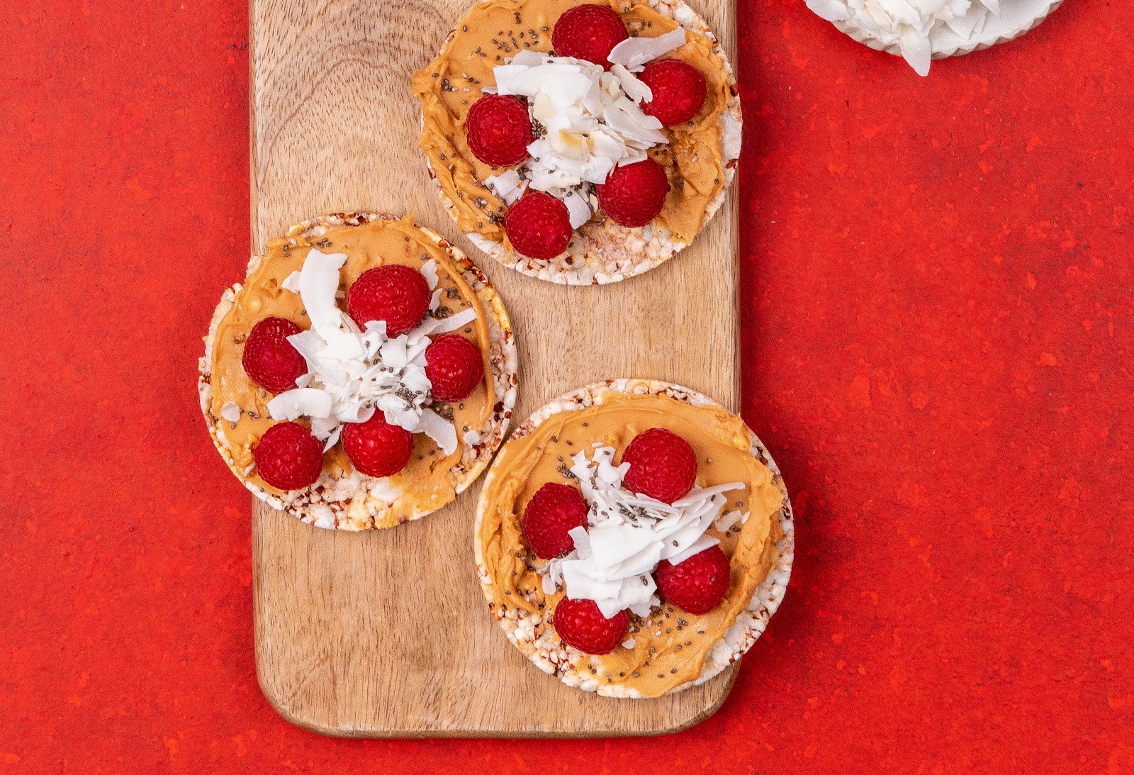 Raspberry, Peanut Butter, Coconut Flakes & Chia on CORN THINS slices (vegetarian & vegan)