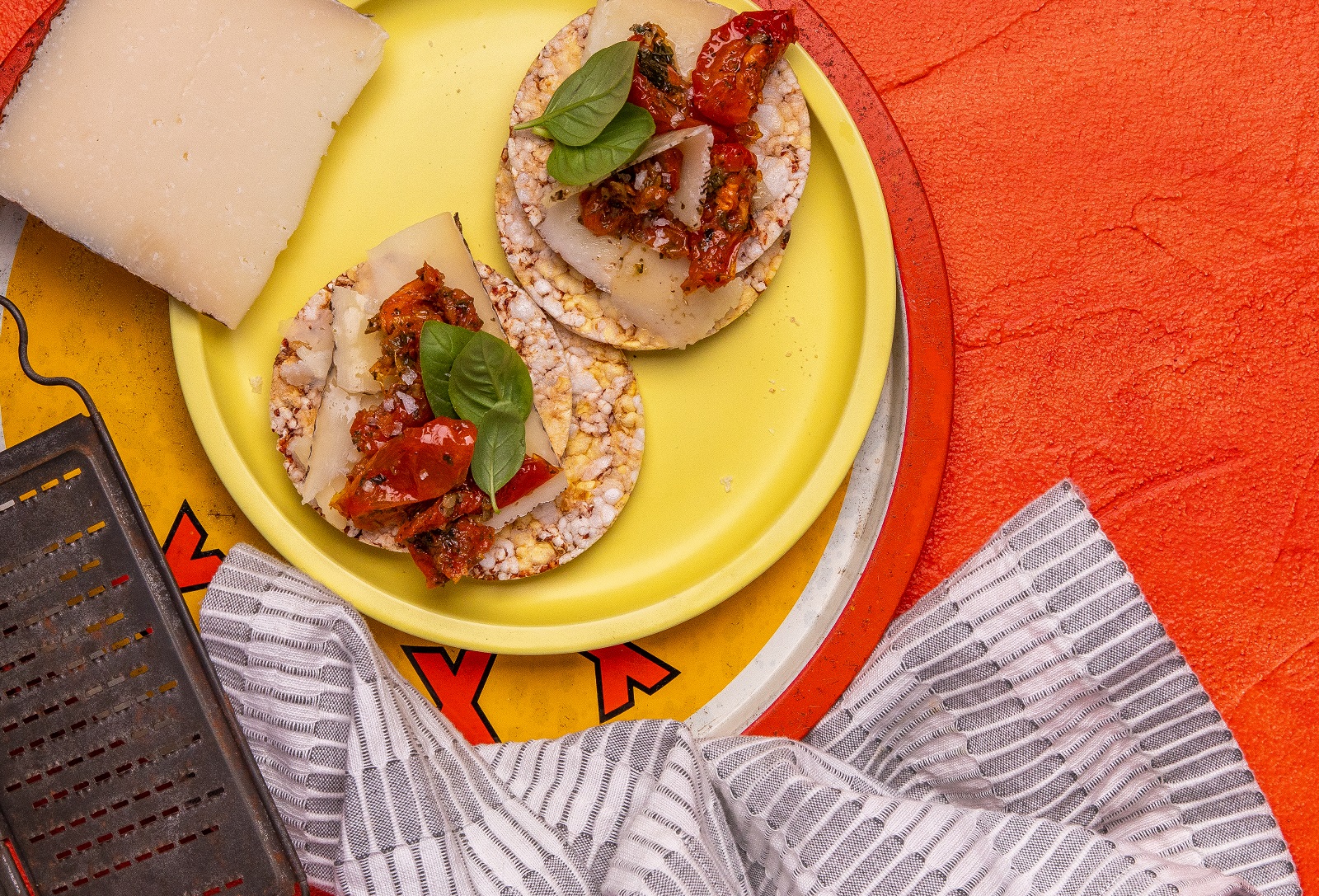 Manchego Cheese, Semi Sundried Tomato & Basil on Corn Thins slices