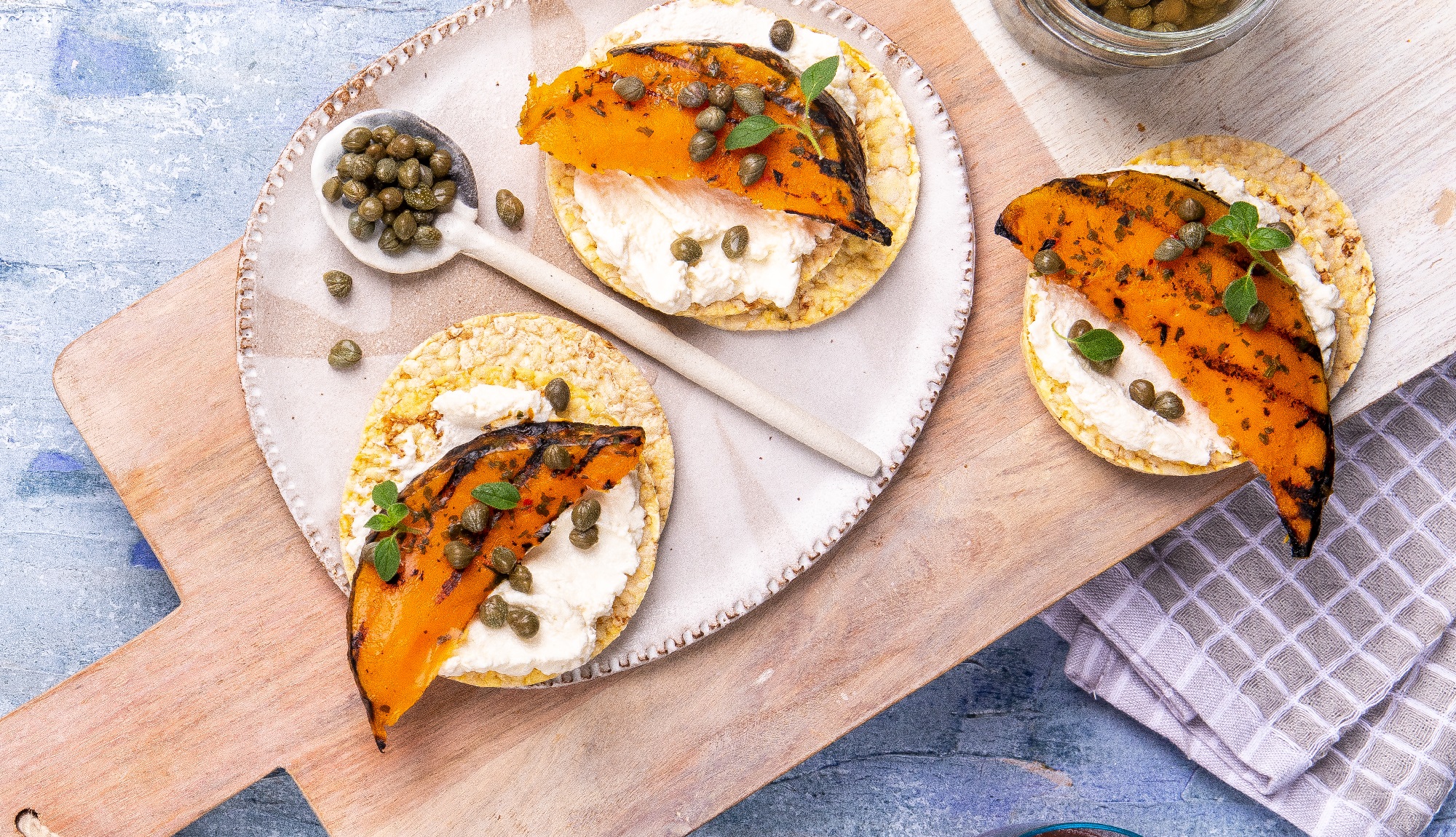 Ricotta, roast pumpkin & capers on Corn Thins slices for lunch