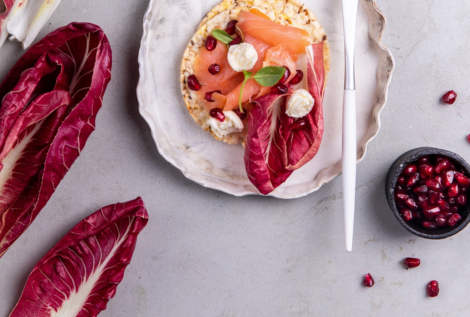 Smoked Salmon, Bocconcini, Basil & Pomegranate seeds on CORN THINS slices