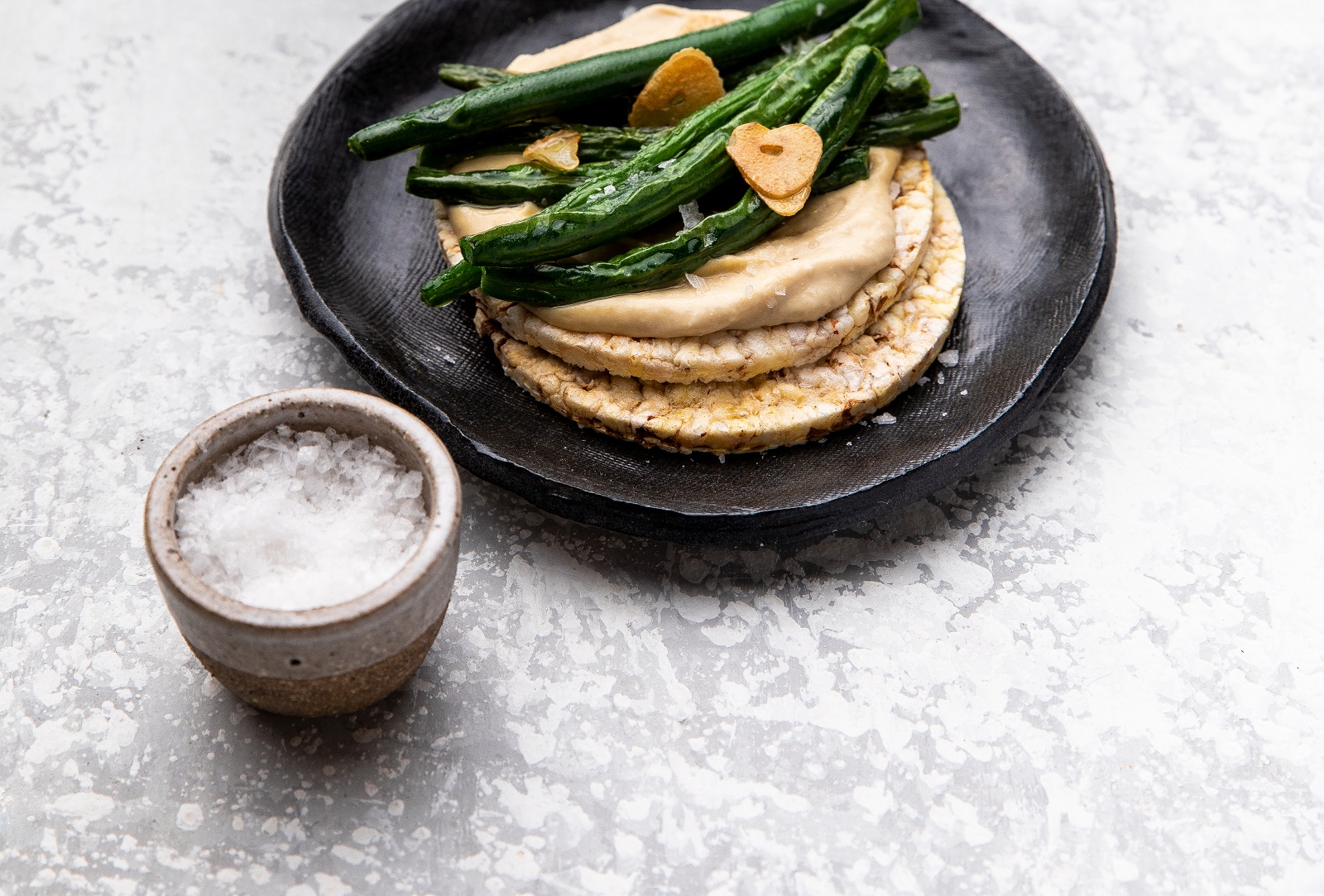 Hommus & Pan Fried Garlic Beans on CORN THINS slices