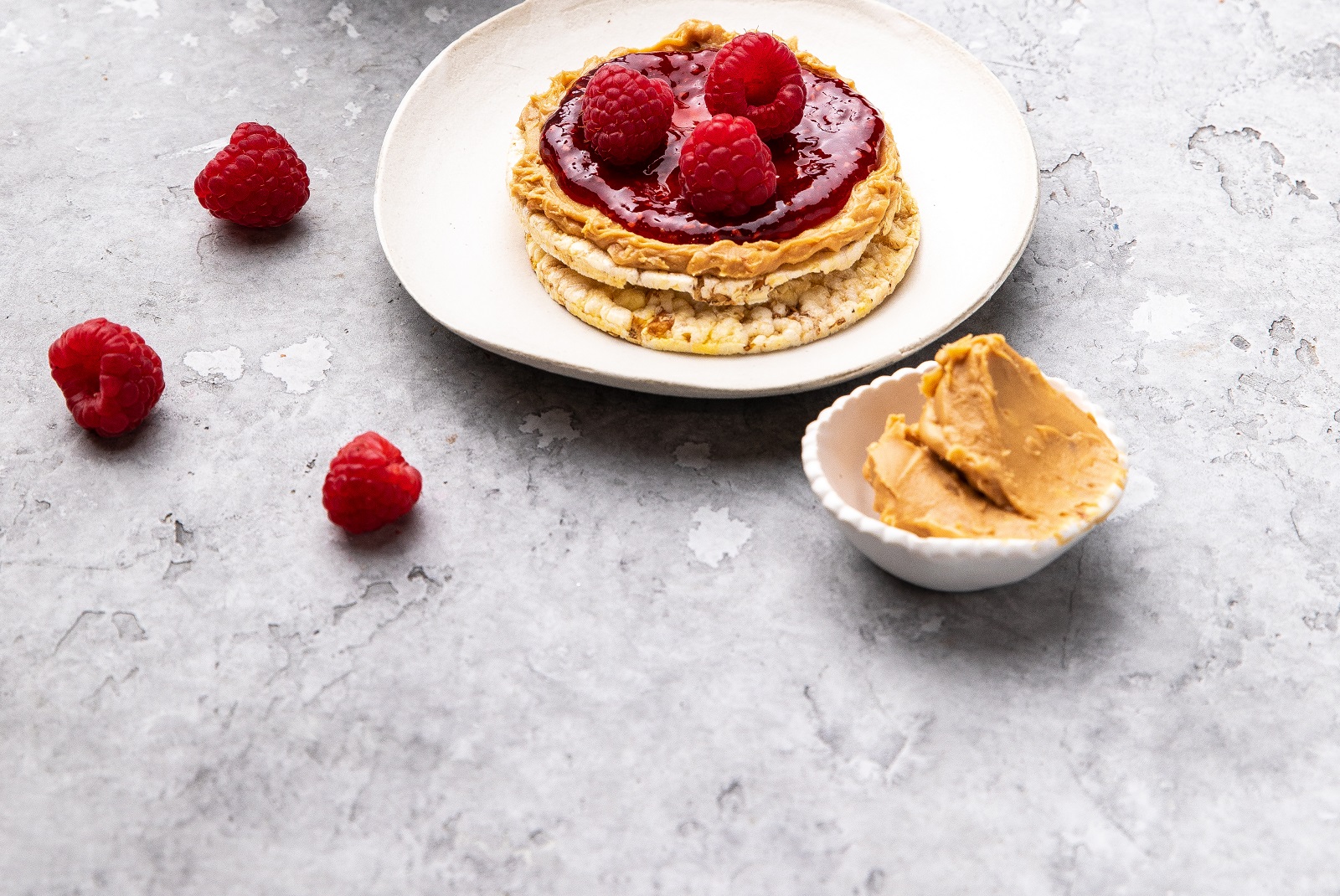 Peanut Butter, Raspberry Jam & Fresh Raspberries on Corn Thins slices