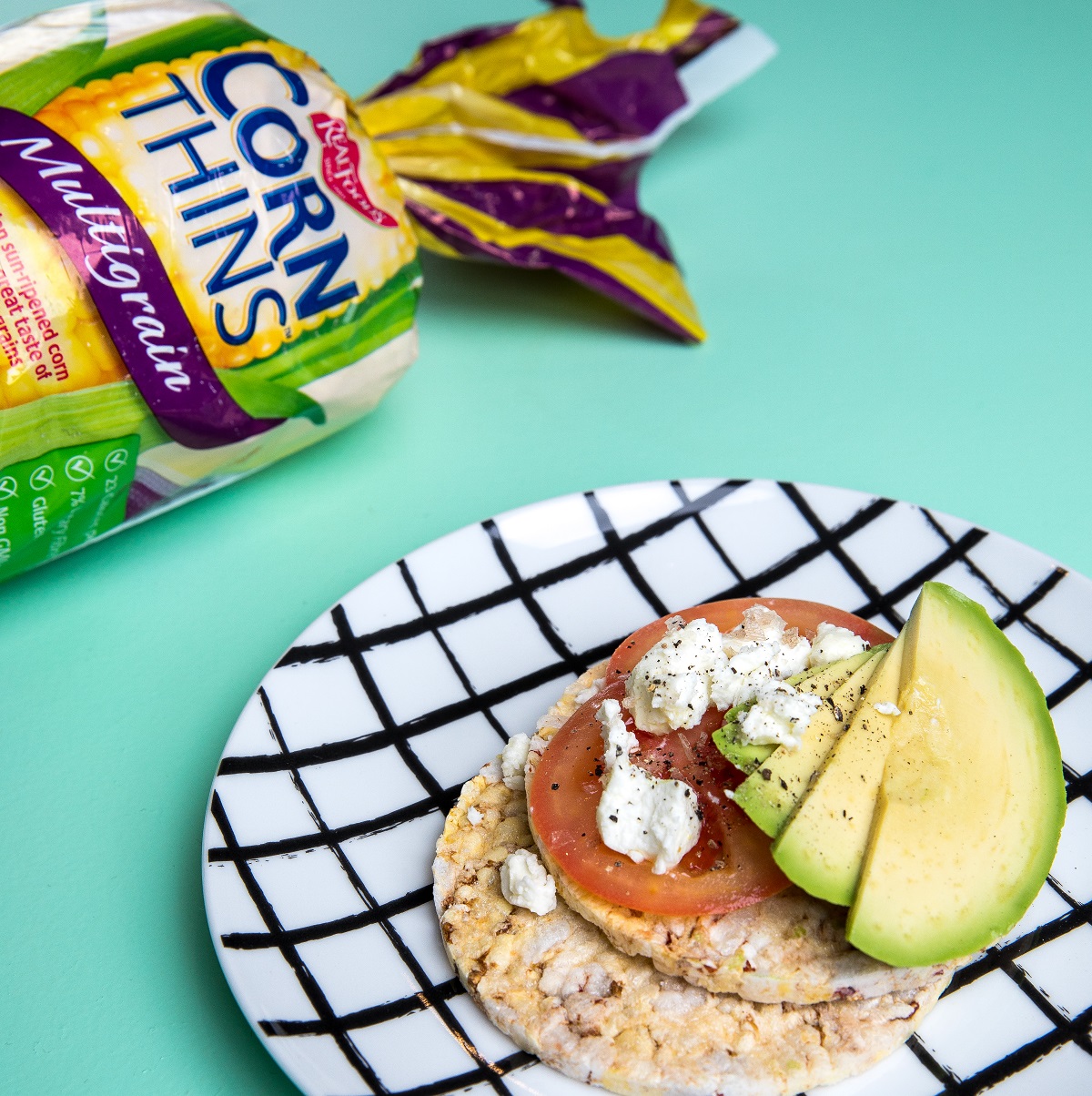 Tomato, avocado & cheese on Corn Thins slices