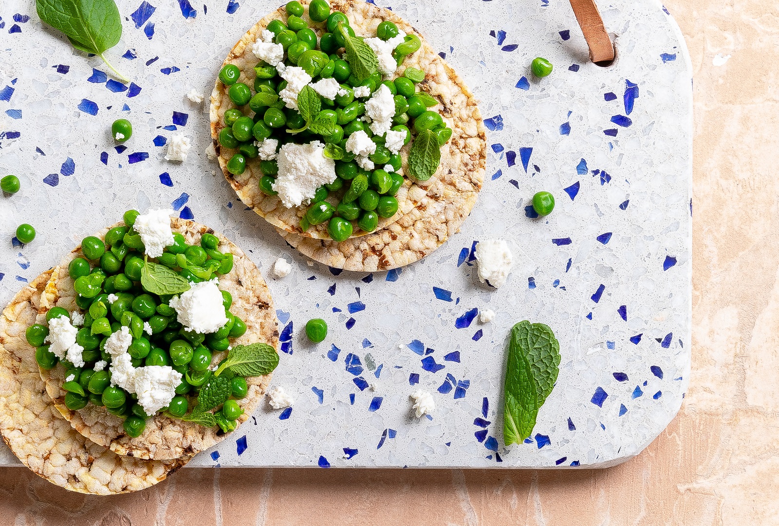 Minted Pea Smash with feta on Corn Thins slices