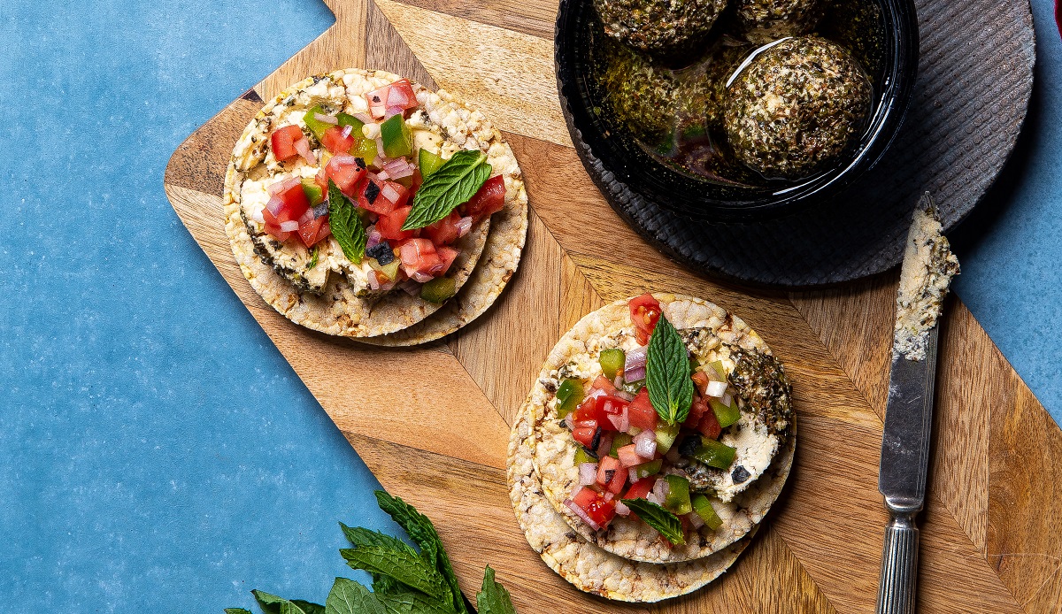 Shanklish with tomato, capsicum & red onion salad on Corn Thins slices for lunch