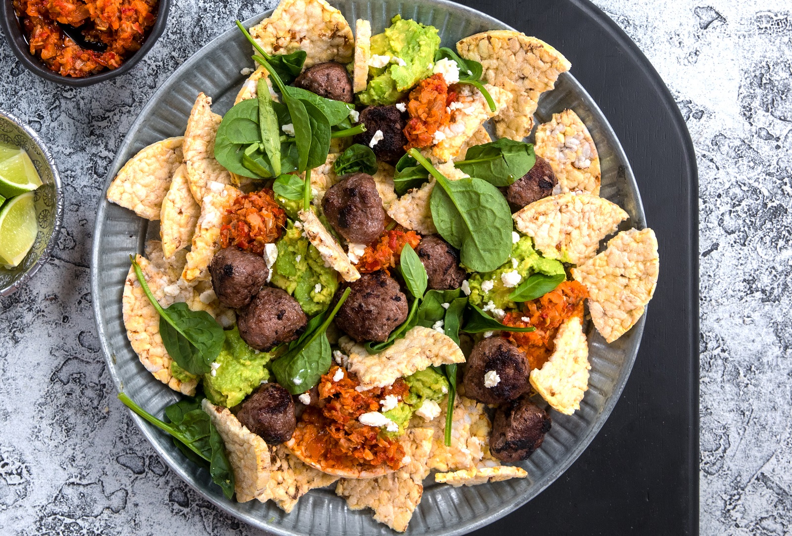 Sausage, Avo, Chili Pickle, Baby Spinach, Feta & Lime Salad with Corn Thins slices