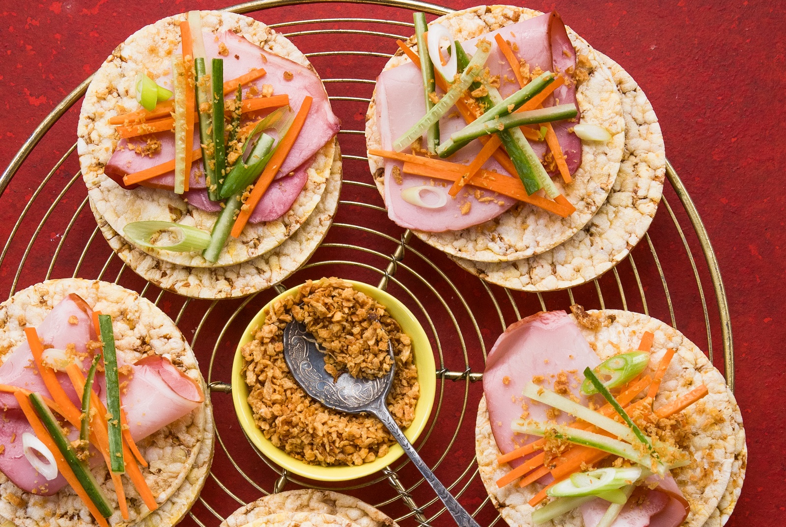 Peking pork, shredded cucumber & carrot, green onion & fried garlic on Corn Thins slices