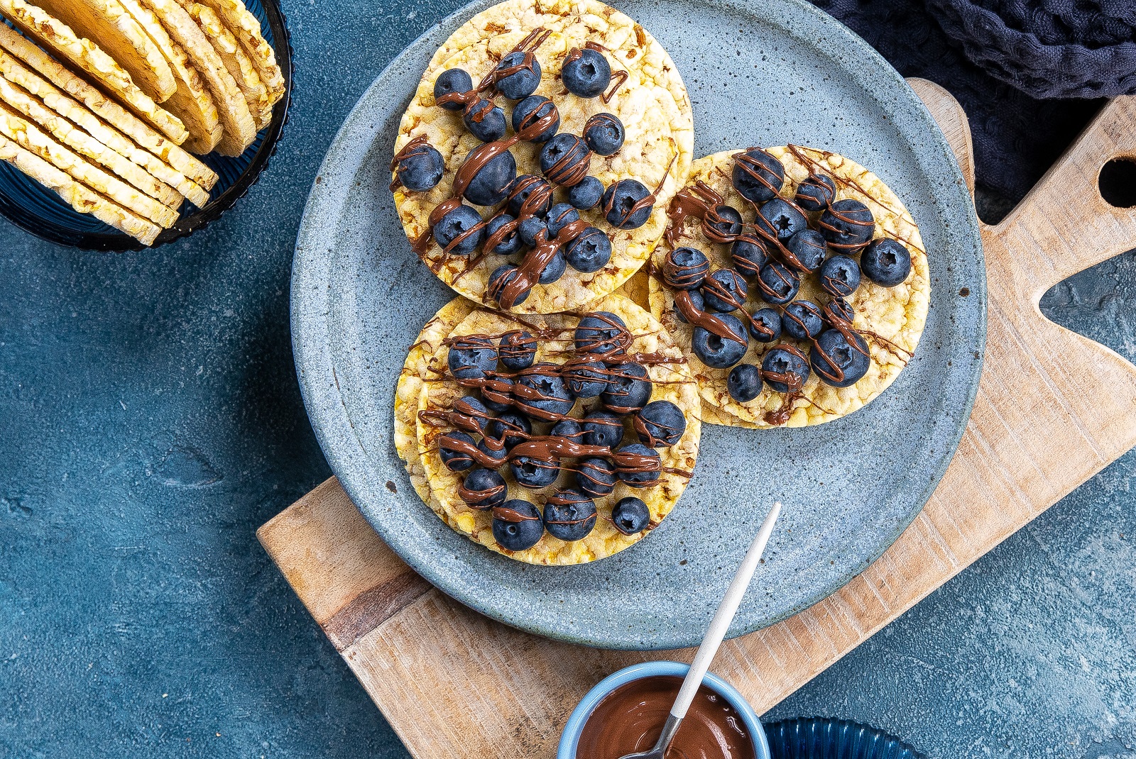 Blueberries & Nutella on Corn Thins slices for breakfast