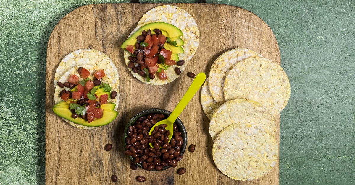 Avocado, beans, tomato & coriander on Corn Thins slices