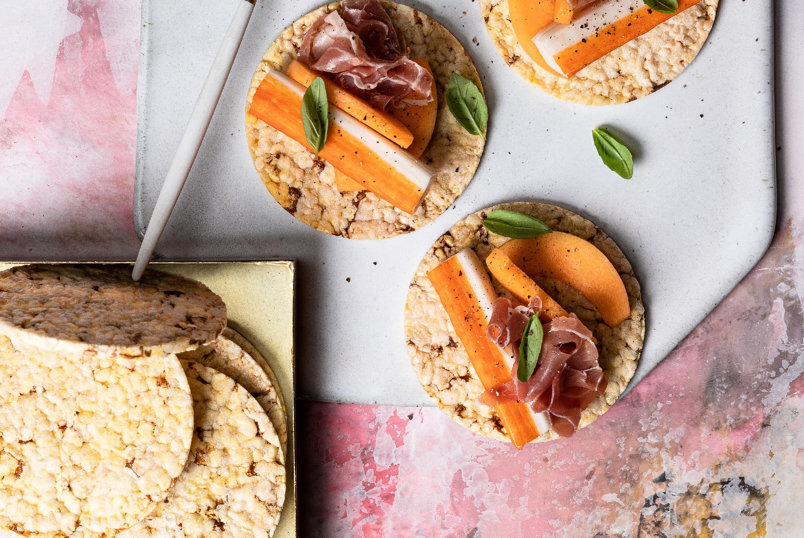 Rockmelon, Crab Stick, Jamon & Basil on Corn Thins slices