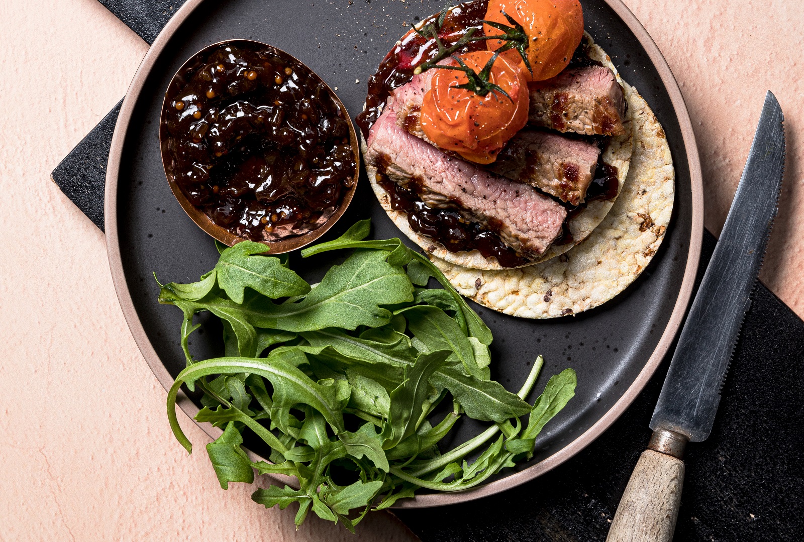 Onion Jam, Steak, Roast Cherry Tomato on Corn Thins slices