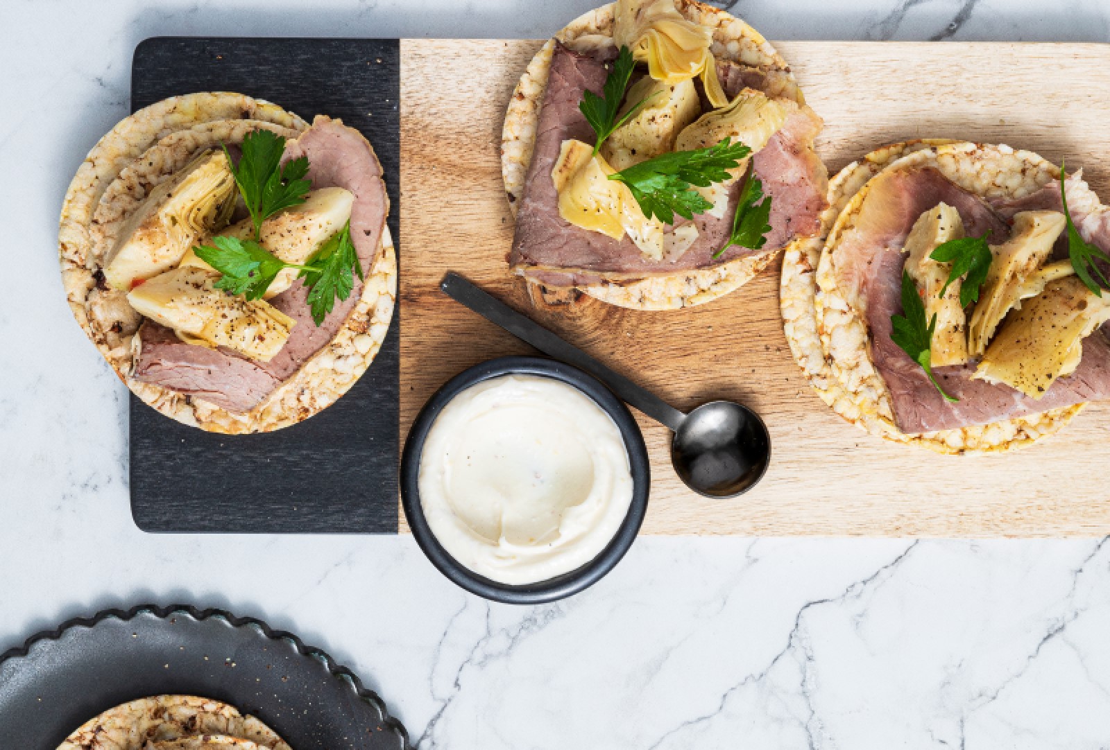 Roast Beef, Marinated Artichoke, Aioli & Parsley on Corn Thins slices