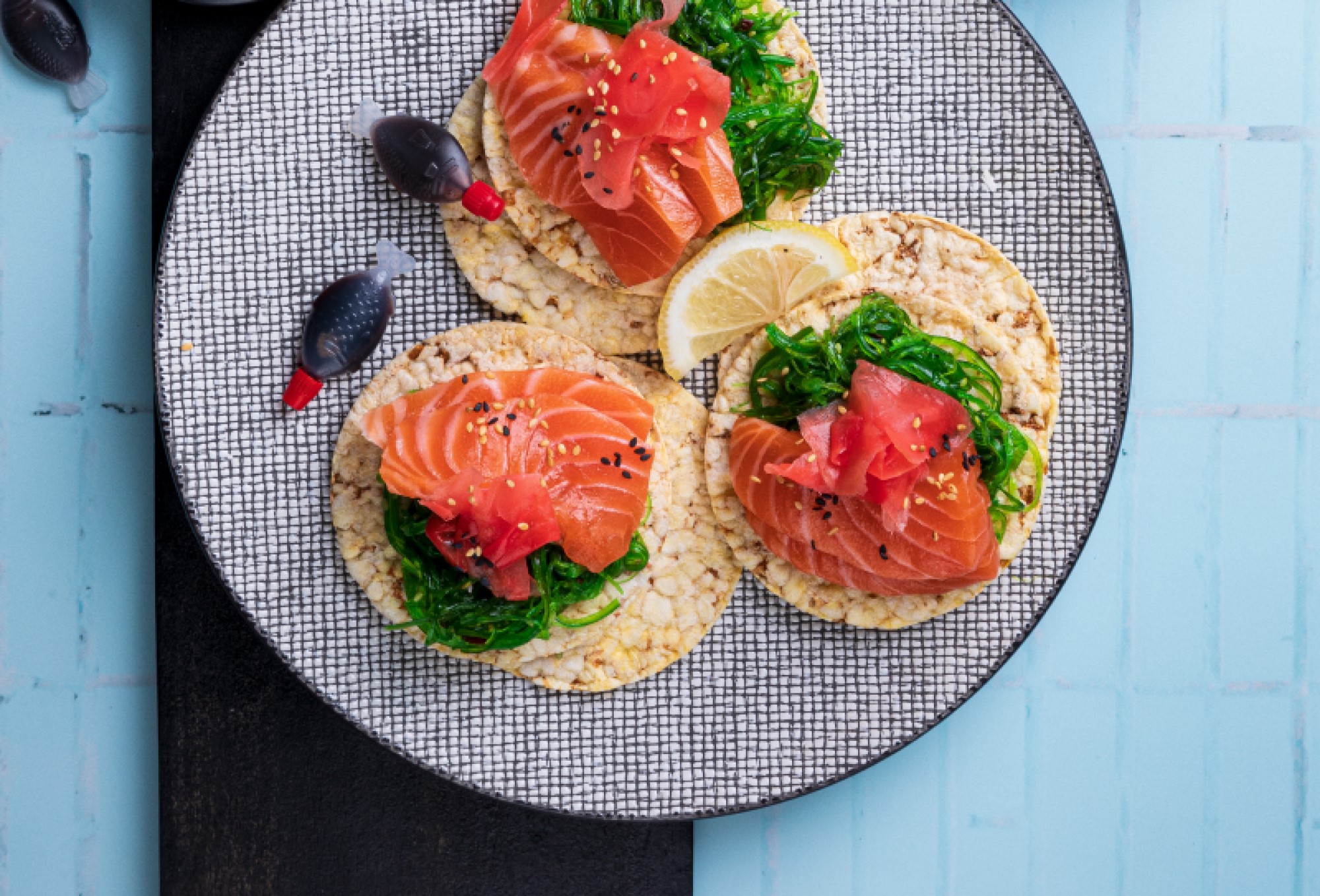 Seaweed Salad, Salmon, Pickled Ginger & Sesame Seeds on Corn Thins slices