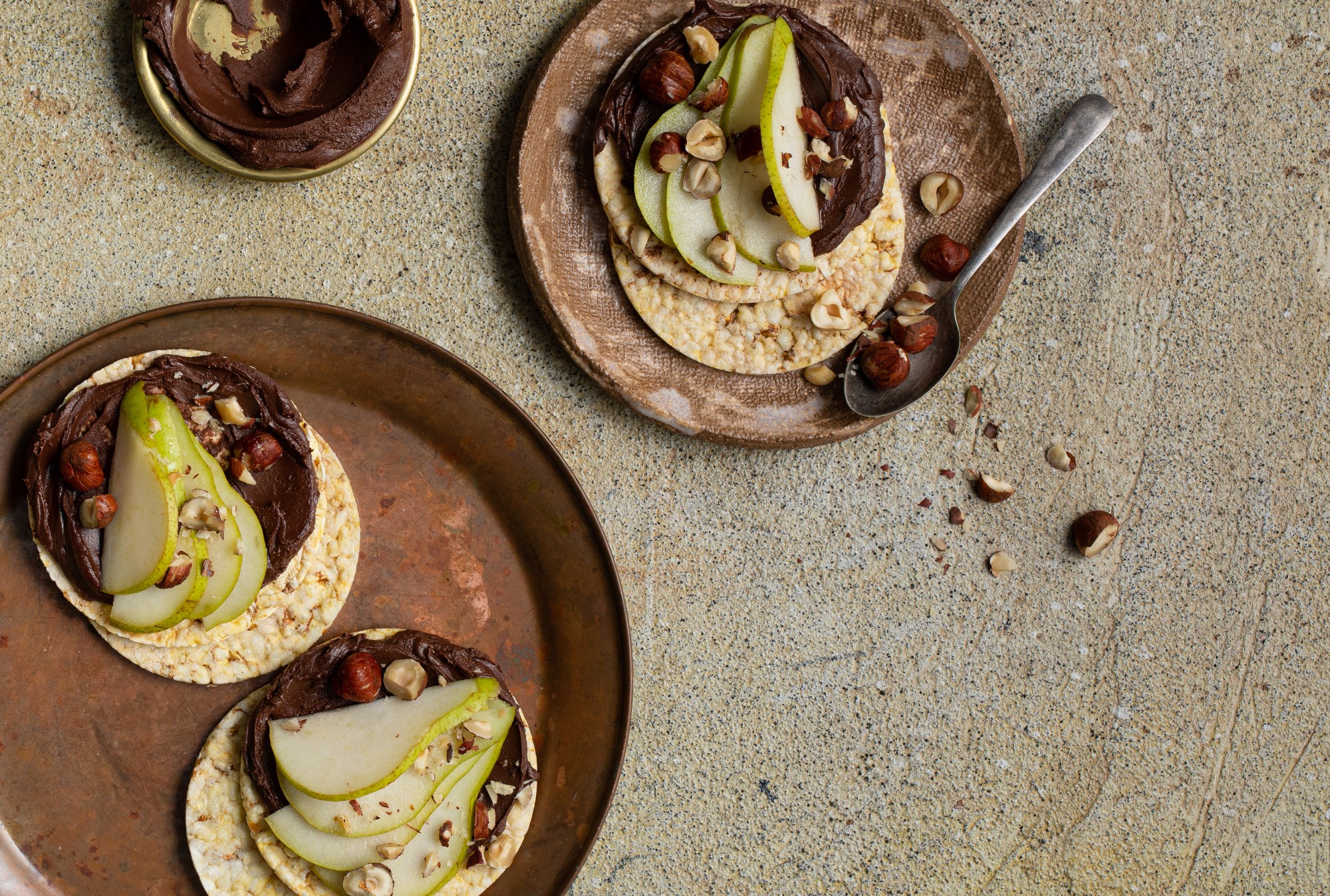 Choc Hazelnut Spread, Pear & Hazelnuts on Corn Thins slices