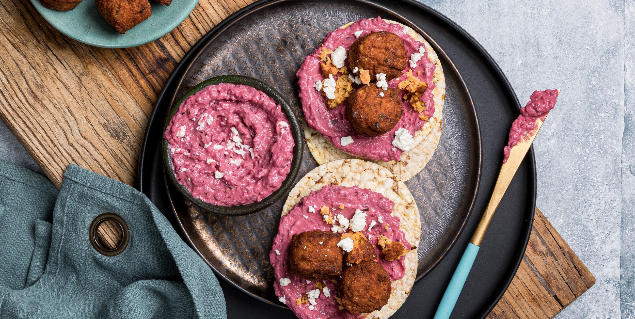 Beetroot Hommus, Veggie Bites & Feta on Corn Thins slices