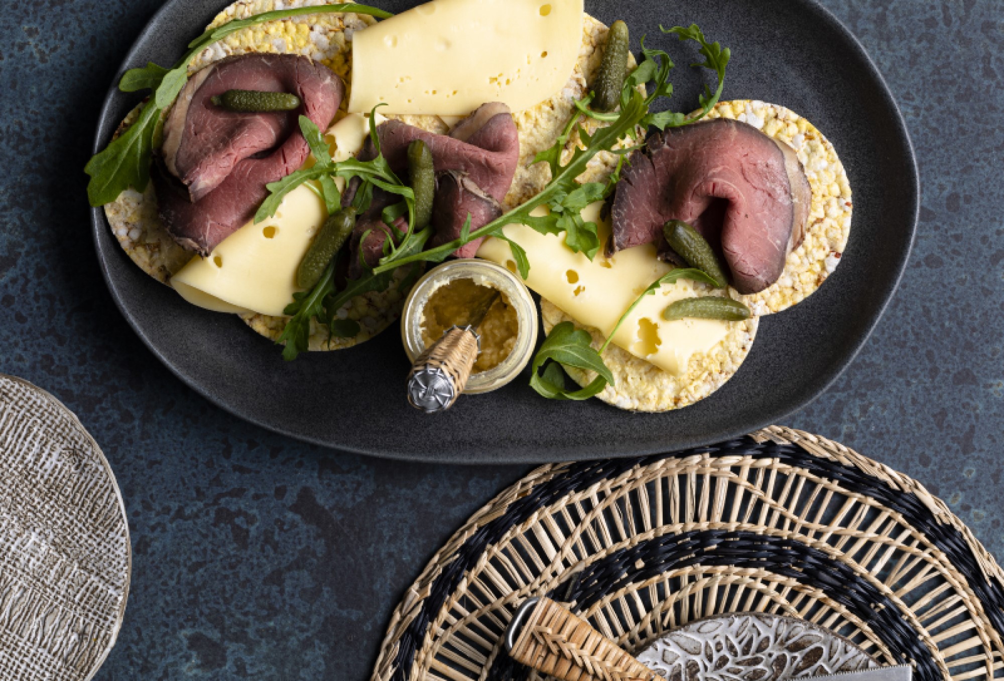 Horseradish, Swiss Cheese, Rare Roast Beef, Rocket & Pickles on Corn Thins slices