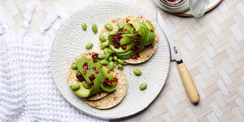 Avocado, Edamame & Chili Oil on Corn Thins slices