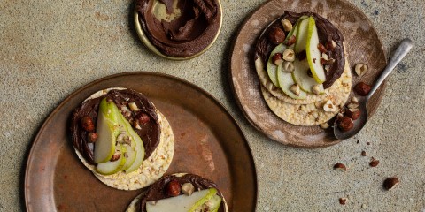 Choc hazelnut spread, pear & hazelnuts on Corn Thins slices