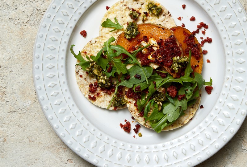 Roasted Pumpkin, Chorizo Crumb, Pesto & Arugula on Corn Thins slices