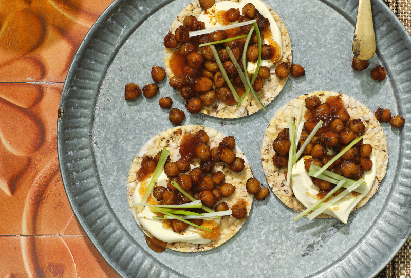 Spiced Chickpea, Sour Cream, Mango Chutney & Spring Onion on Corn Thins slices