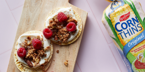 Greek Yoghurt, granola & raspberries on Corn Thins slices