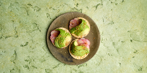 Avocado, radish, EVOO & Dukkah on Corn Thins slices