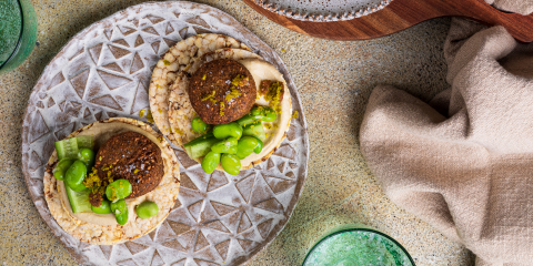 Hommus, falafel, cucumber, broad beans on Corn Thins slices