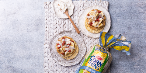 Peanut butter, banana, goji berries, coconut flakes & chia on Corn Thins slices