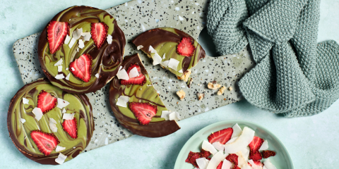 Dark choc, matcha white choc, dehydrated strawberry and coconut on Corn Thins slices