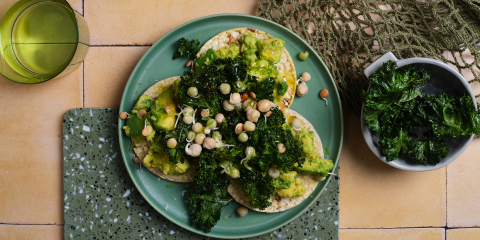 Smashed avo, kale chips, sprouts & EVOO on Corn Thins slices
