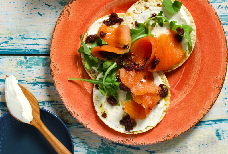 cream cheese, smoked trout, rocket and olive tapenade on Corn Thins slices