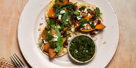 Roast pumpkin, Zhoug, Kale, almonds, cranberries & herb on Corn Thins slices