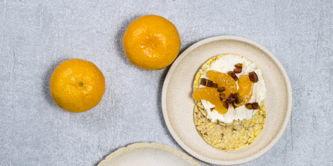 Ricotta, Mandarin & Chopped Dates on Corn Thins slices
