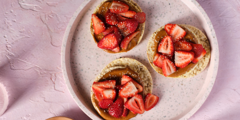 Almond butter, Strawberries & Chia seeds on Corn Thins slices