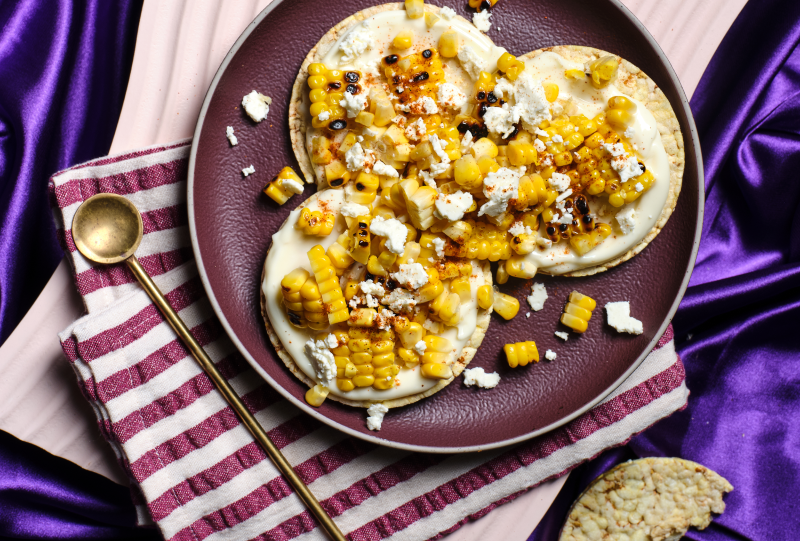 Lime Mayo, Grilled Corn, Cotija Cheese & Chilli Powder on Corn thins slices