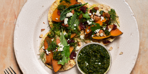 Roast pumpkin, Zhoug, Kale, almonds, cranberries & herb on Corn Thins slices