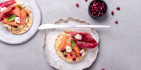 smoked salmon, bocconcini, basil & pomegranate on Corn Thins slices