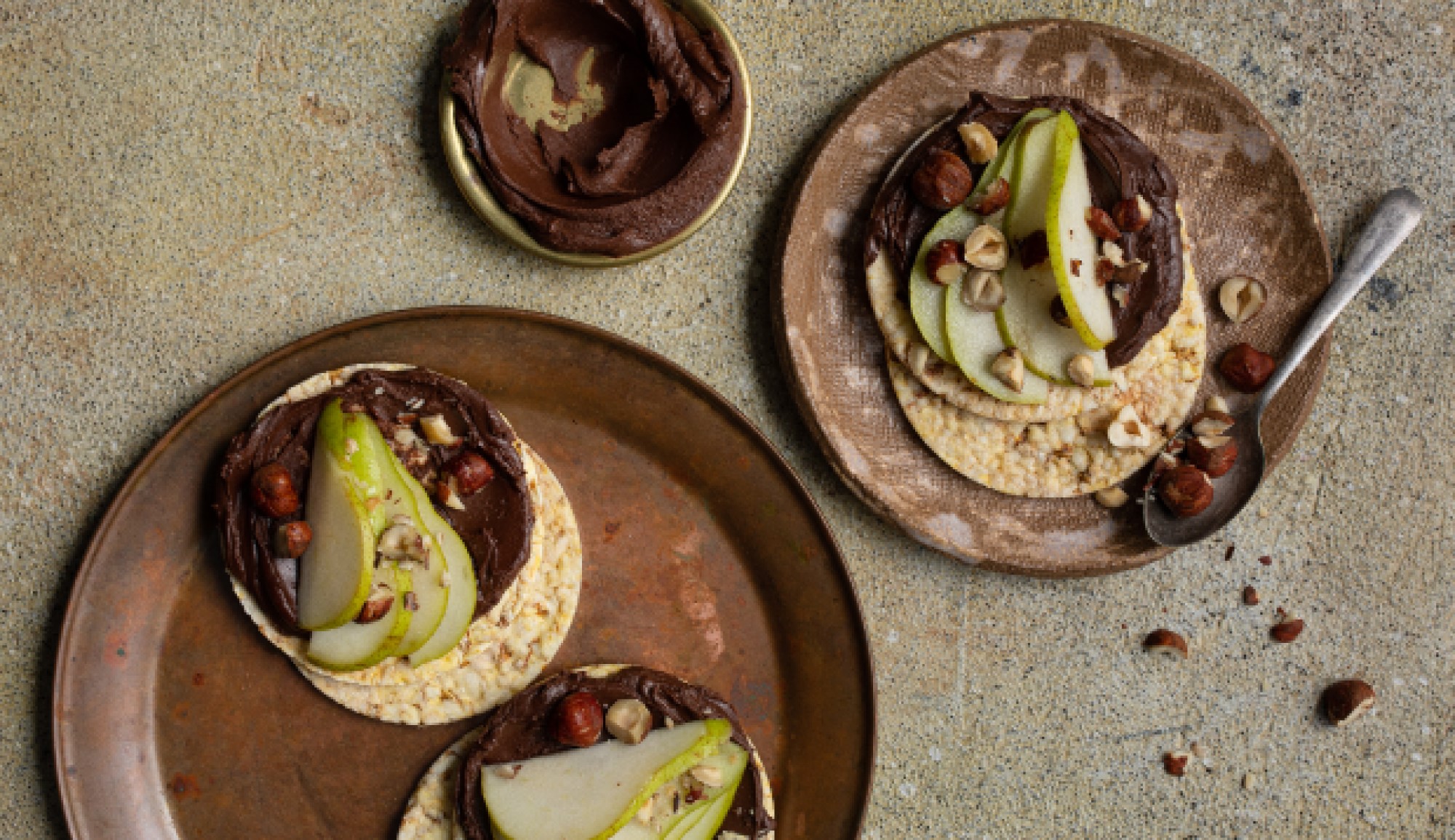 Choc Hazelnut Spread, pear & hazelnuts on CORN THINS slices