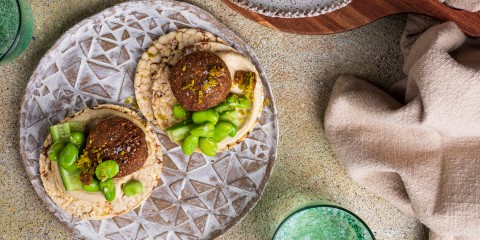 Hommus, falafel, cucumber and broad beans on Corn Thins slices