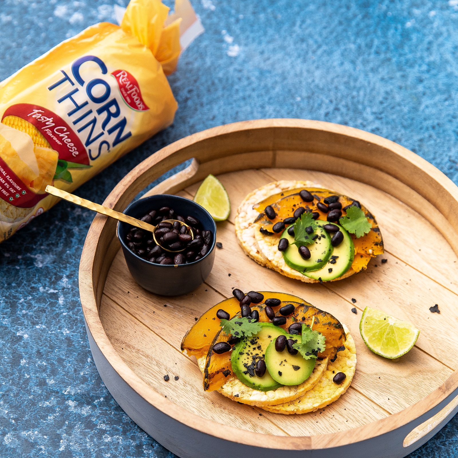 Roast pumpkin, black bean, coriander & Avocado on Corn Thins slices