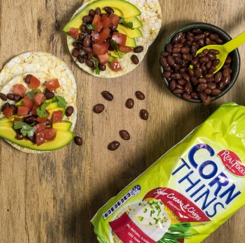 Avocado, tomato, black beans & coriander on Corn Thins slices for lunch