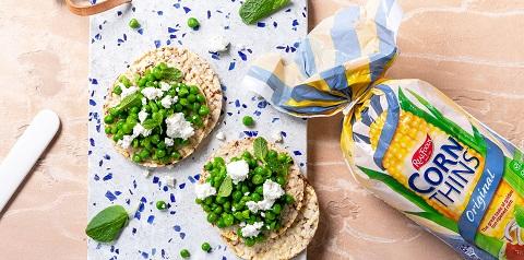 Minted pea smash with feta on CORN THINS slices