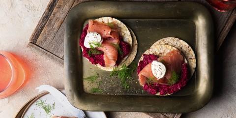 Roasted beetroot dip, smoked salmon, horseradish, creme fraiche & dill on Corn Thins slices