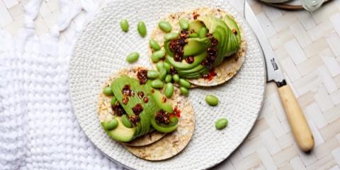 Avocado, Edamame & Chili Oil on Corn Thins slices