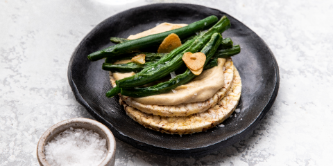 Hommus, & pan-fried beans on Corn Thins slices